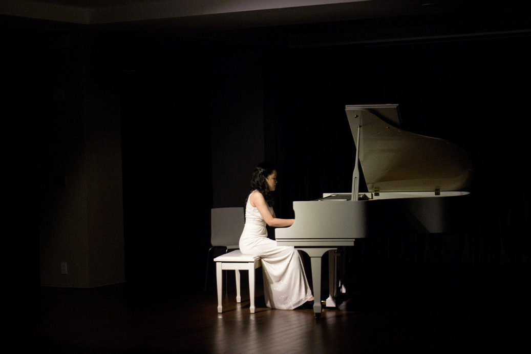 woman-playing-grand-piano